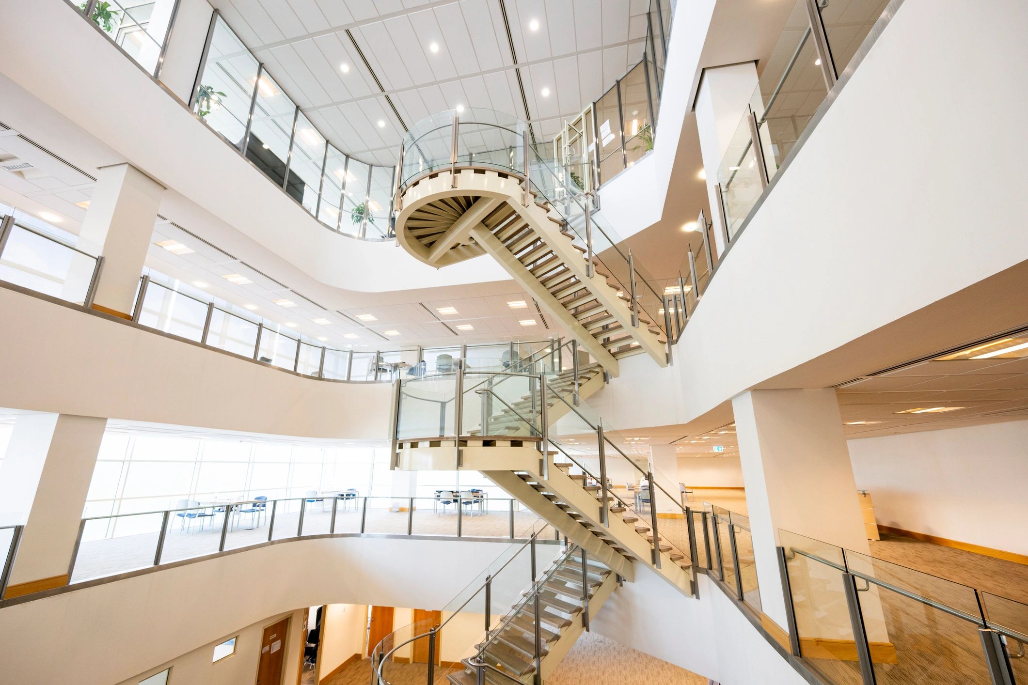 Modern corporate atrium representing advisory environment